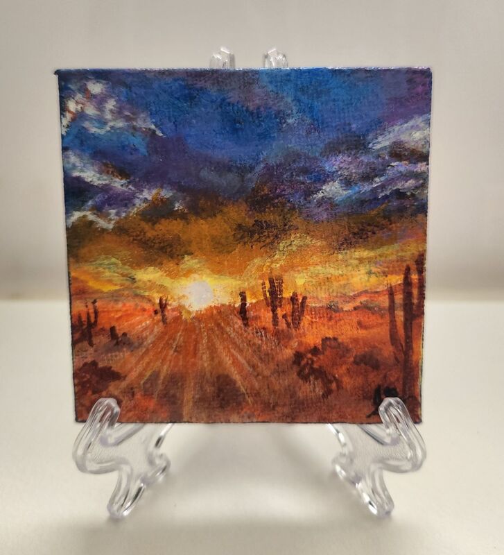 Miniature Painting of a scenic Desert Sunrise. Colorful Clouds adorn the magestic Sunrise or Sunset.
